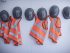 Rows of hard hats and high vis jackets on portable cabin wall Source: imagesourcecurated